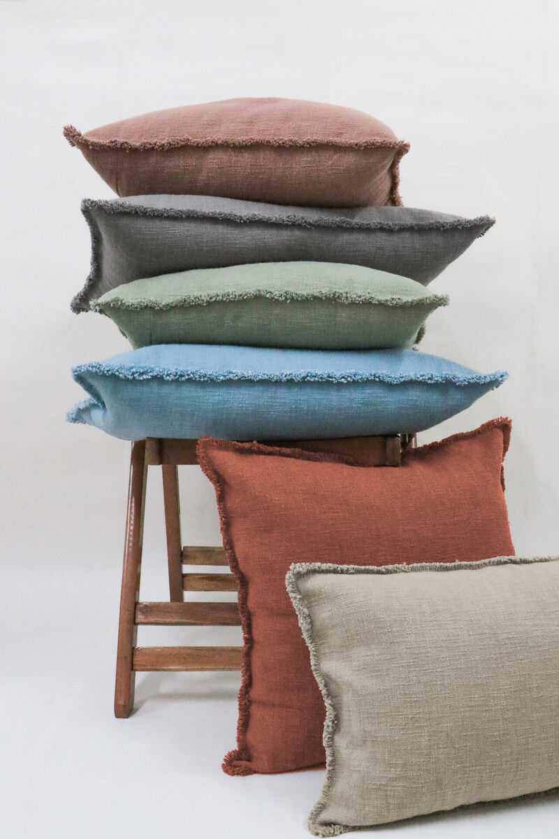 Organic Chic washed textured cotton solid pillow with frayed edges