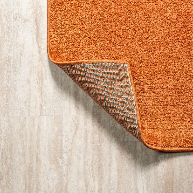 Haze Solid Low-Pile Red Area Rug