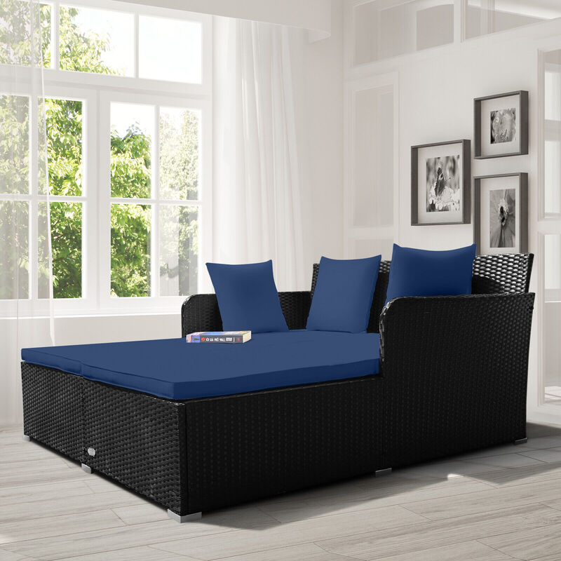 Spacious Outdoor Rattan Daybed with Upholstered Cushions and Pillows