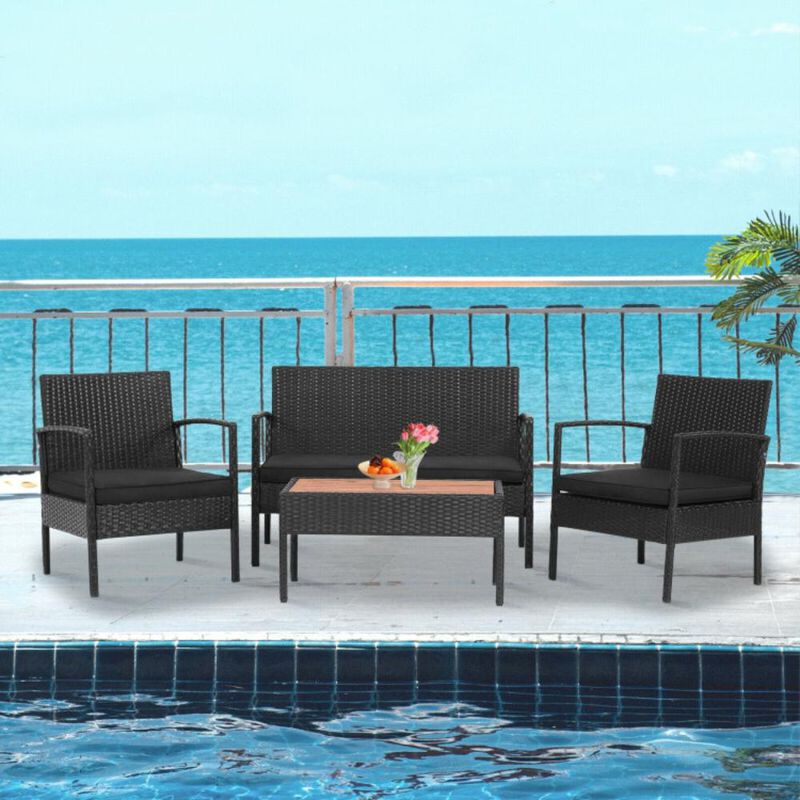 Hivvago 4 Pieces Patio Rattan Cushioned Furniture Set with Wooden Tabletop