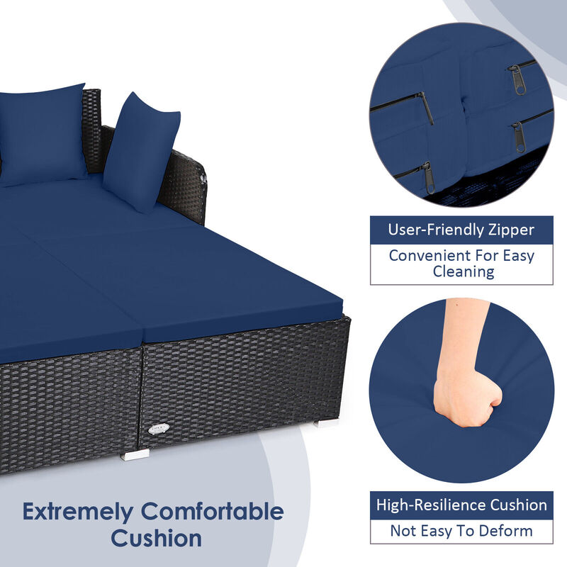 Spacious Outdoor Rattan Daybed with Upholstered Cushions and Pillows
