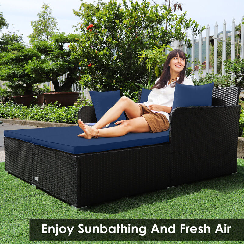 Spacious Outdoor Rattan Daybed with Upholstered Cushions and Pillows