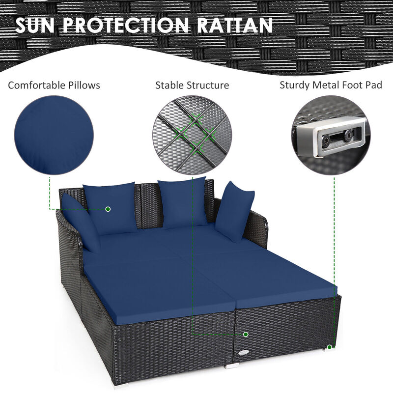 Spacious Outdoor Rattan Daybed with Upholstered Cushions and Pillows