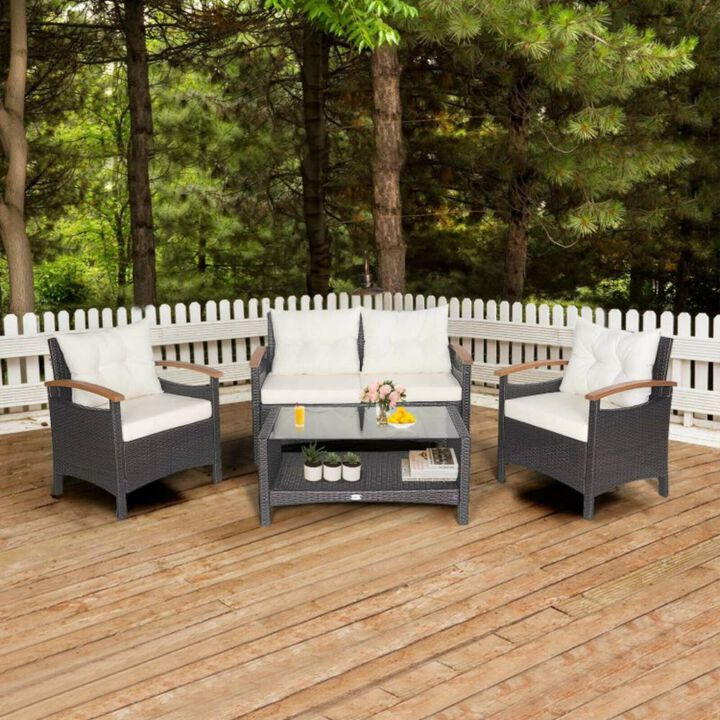 Hivvago 4 Pieces Patio Rattan Furniture Set with Cushioned Sofa and Storage Table